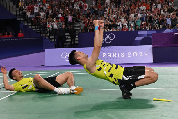 4U羽毛球拍重量揭秘，为什么职业选手偏爱这个规格？